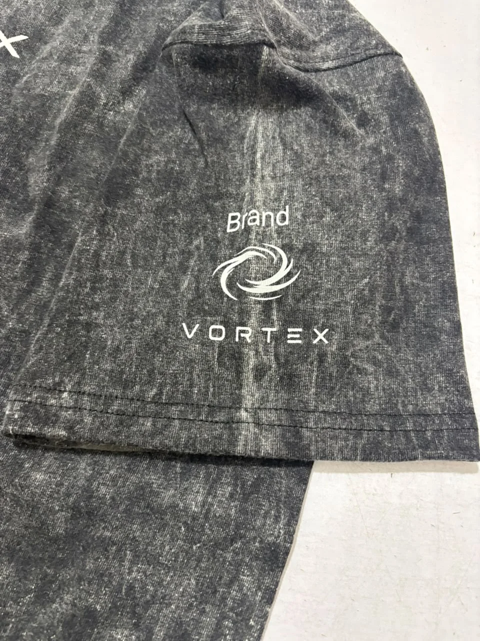 Sleeve print on the acid-wash t-shirt