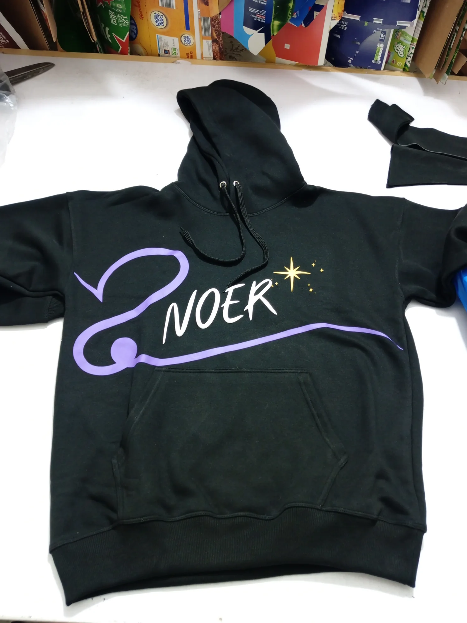 Custom black hoodie with puff print made by Linushi Manufacturer