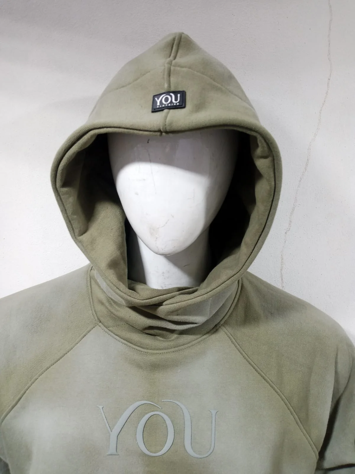 Custom woven brand label on the hood