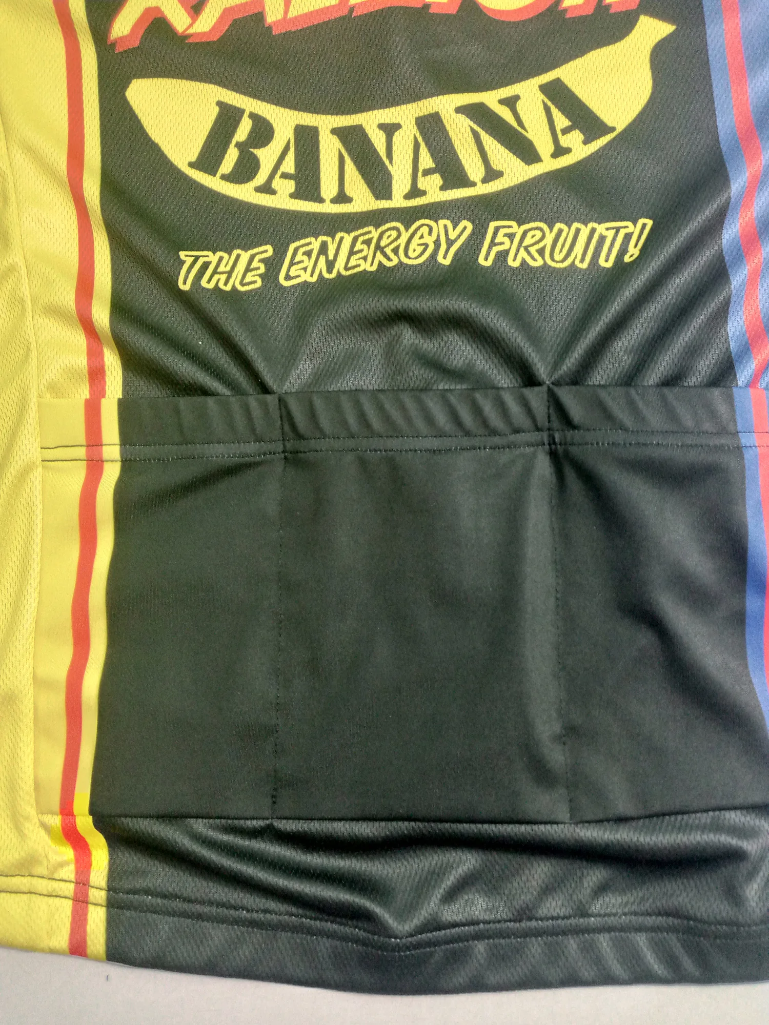 Close-up of three rear pockets and mesh fabric