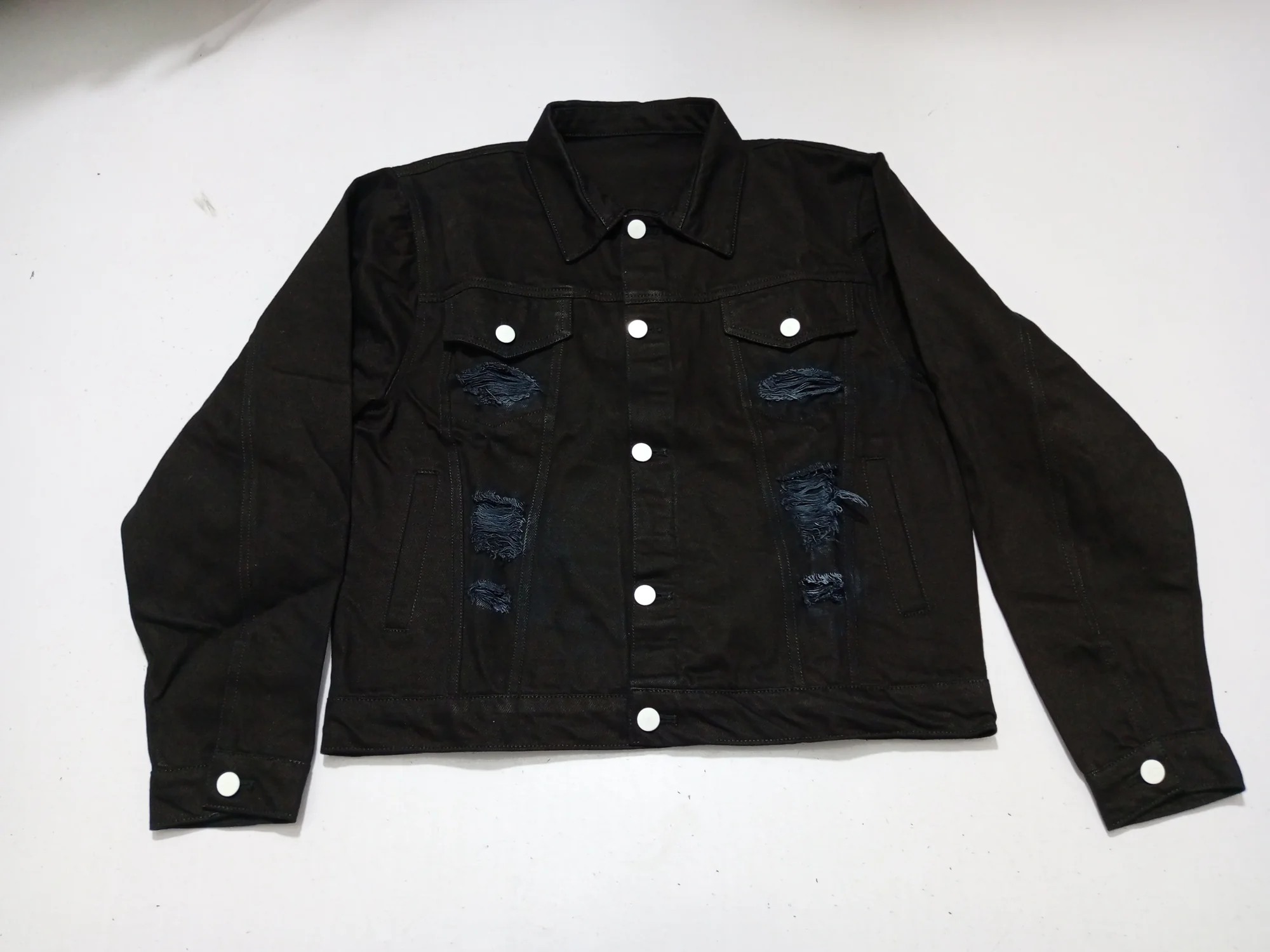 Distressed sleeve and chest