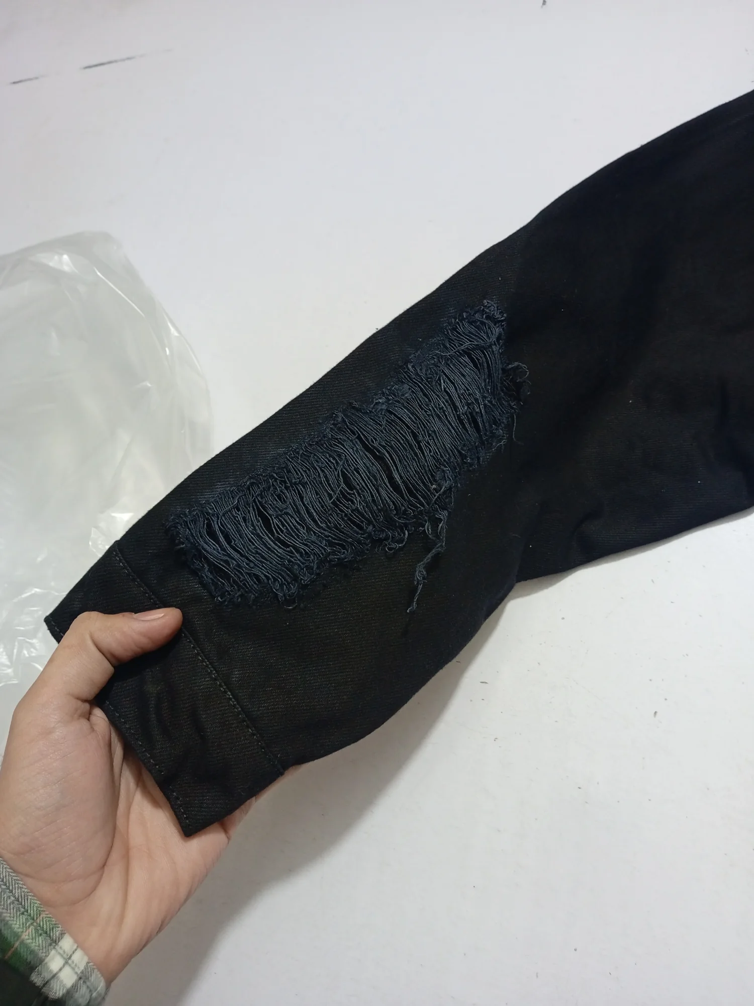 Close-up of the sleeve distressing