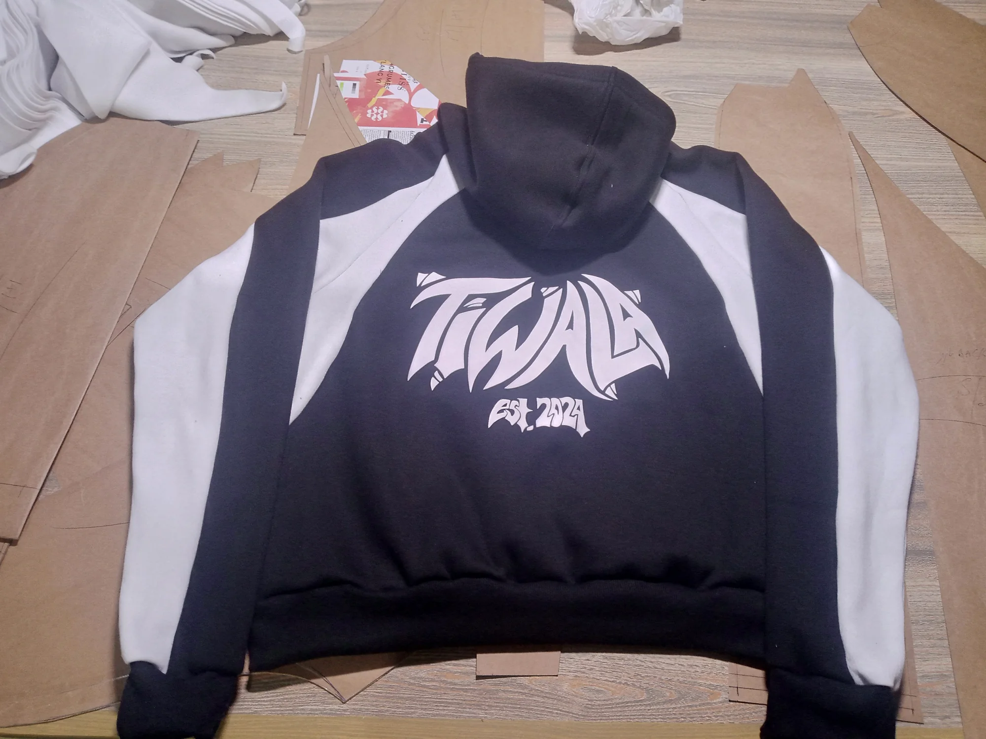Panelled hoodie on the pattern-cutting table