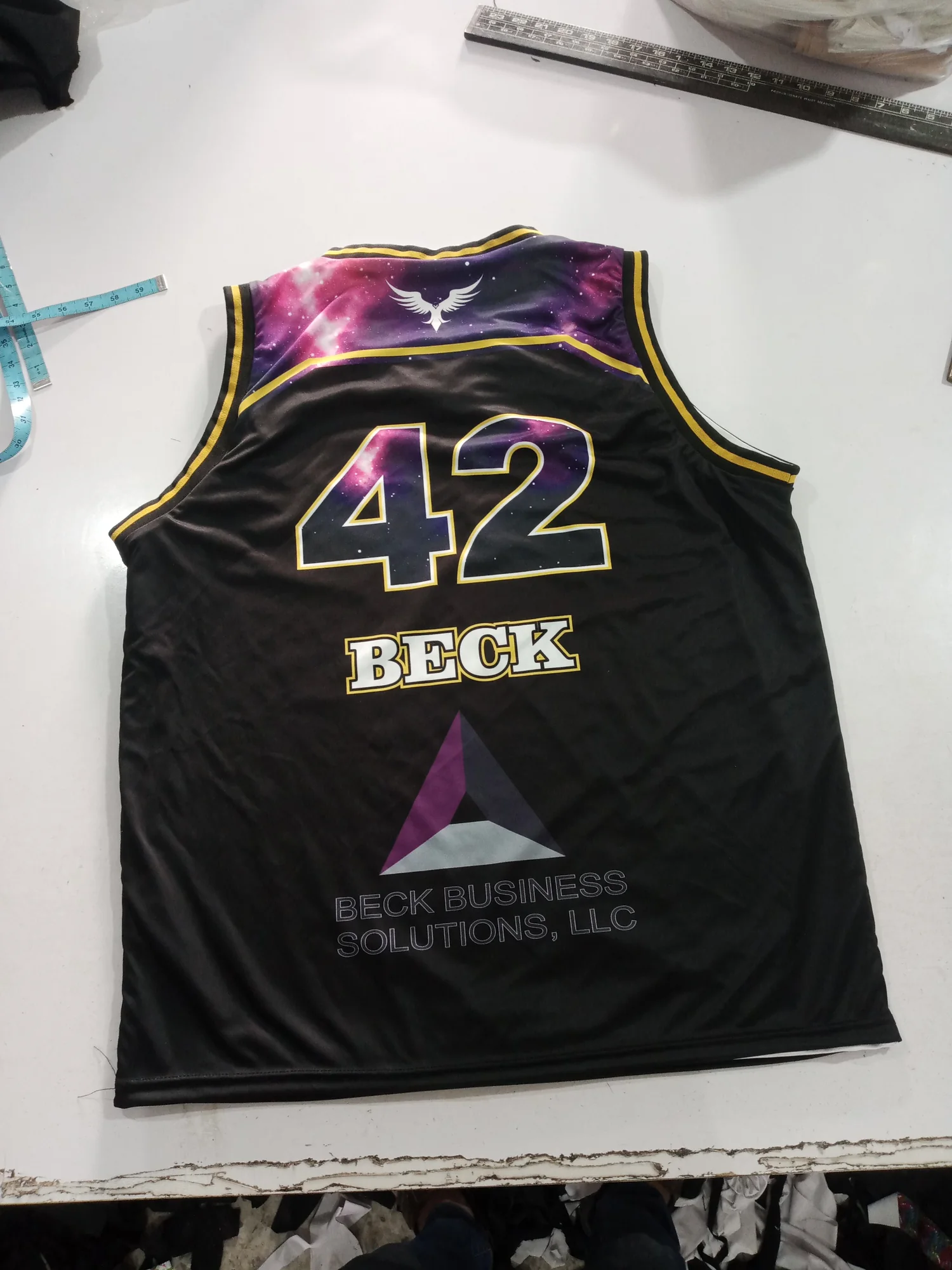 Reversible jersey, black side back with player name and number