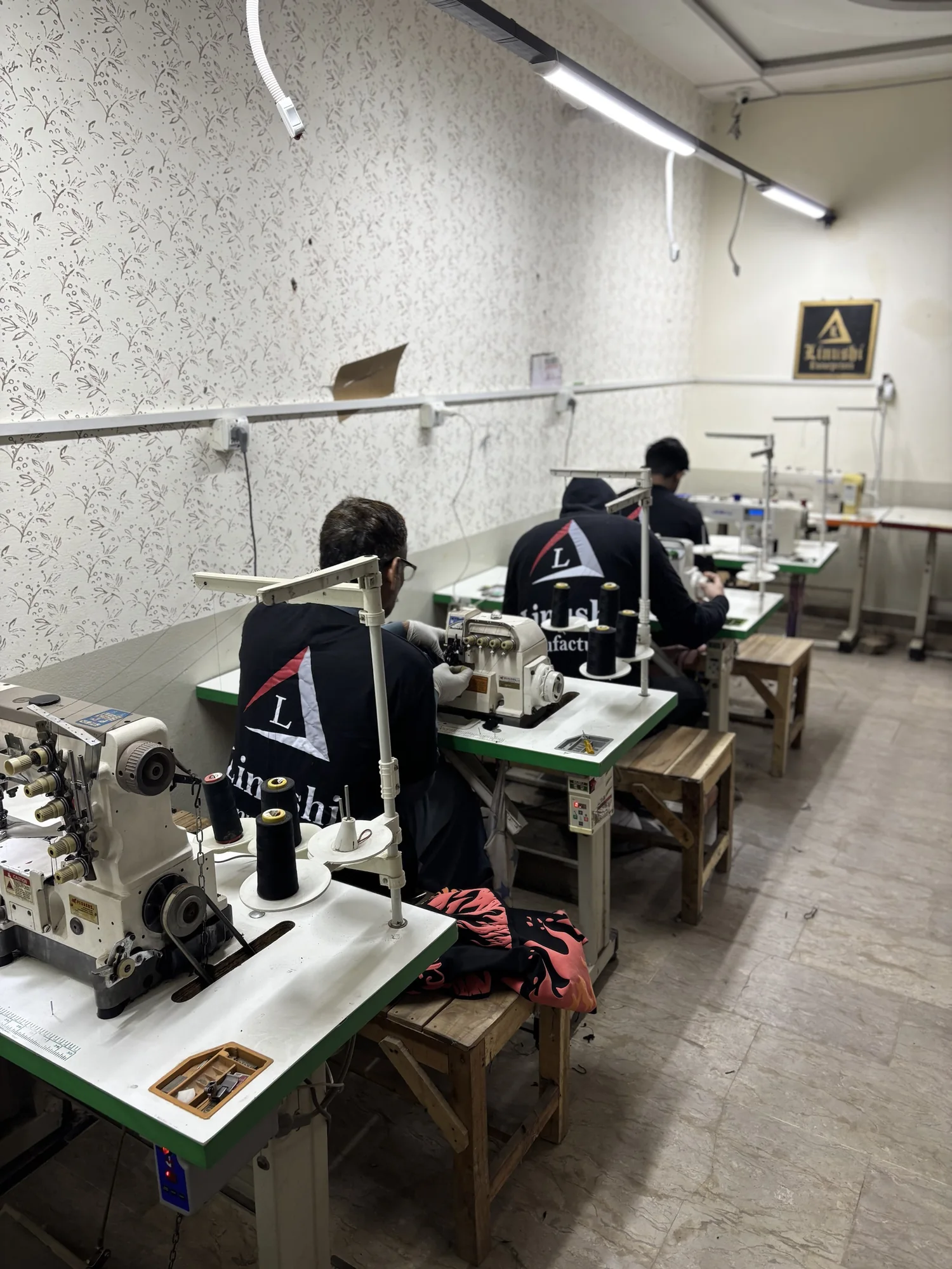 Stitching team on the Linushi clothing factory sewing floor