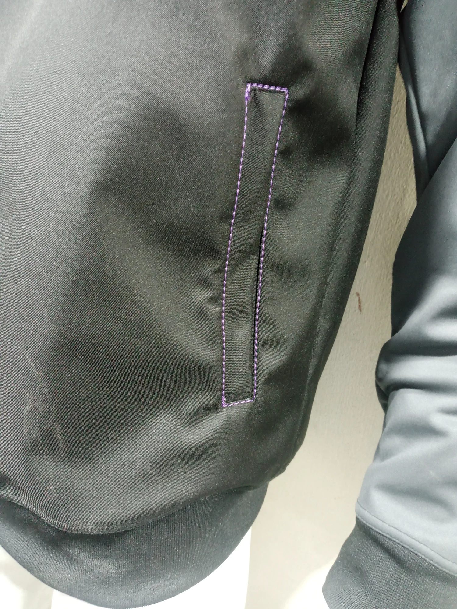 Welt pocket with contrast stitching