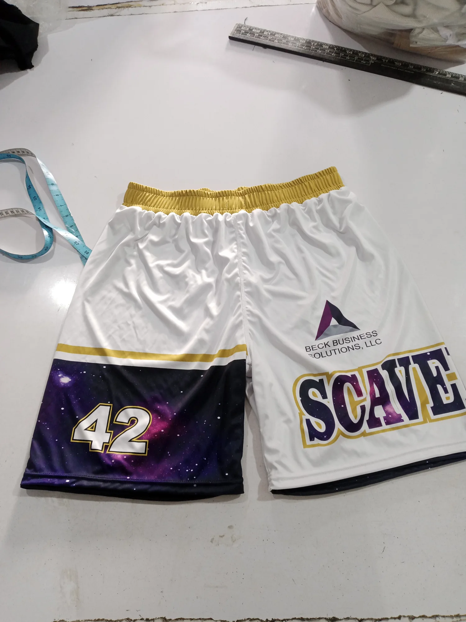 Sublimated basketball shorts, white side