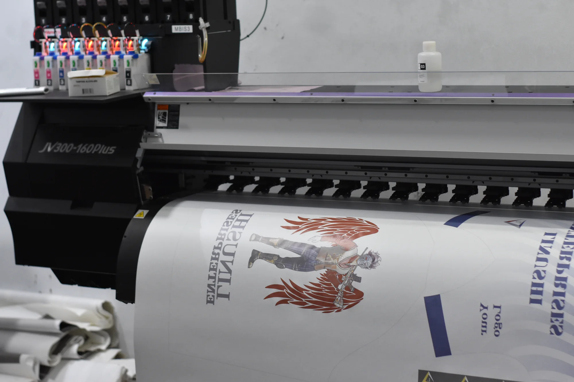 Sublimation printing custom artwork for a garment at Linushi